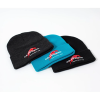 Drei Kopfbedeckungen in Blau und Schwarz mit Inlandsis Schriftzug