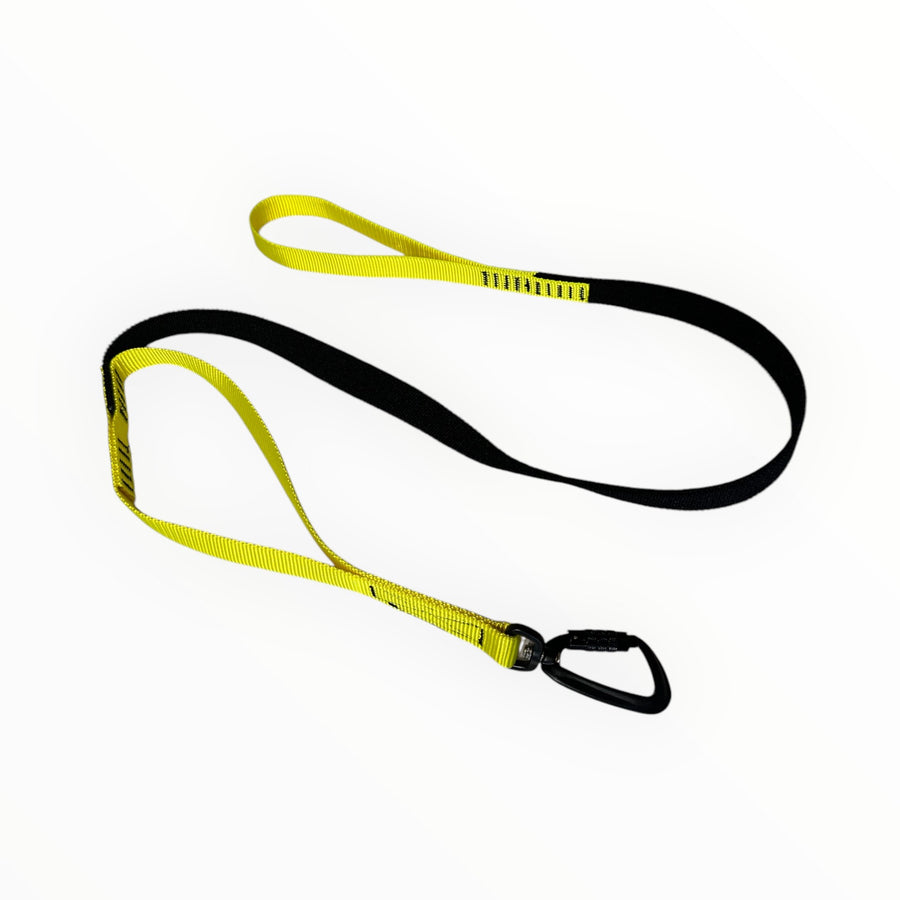 eine gelbe CaniX Leash Leine mit schwarzem Karabiner